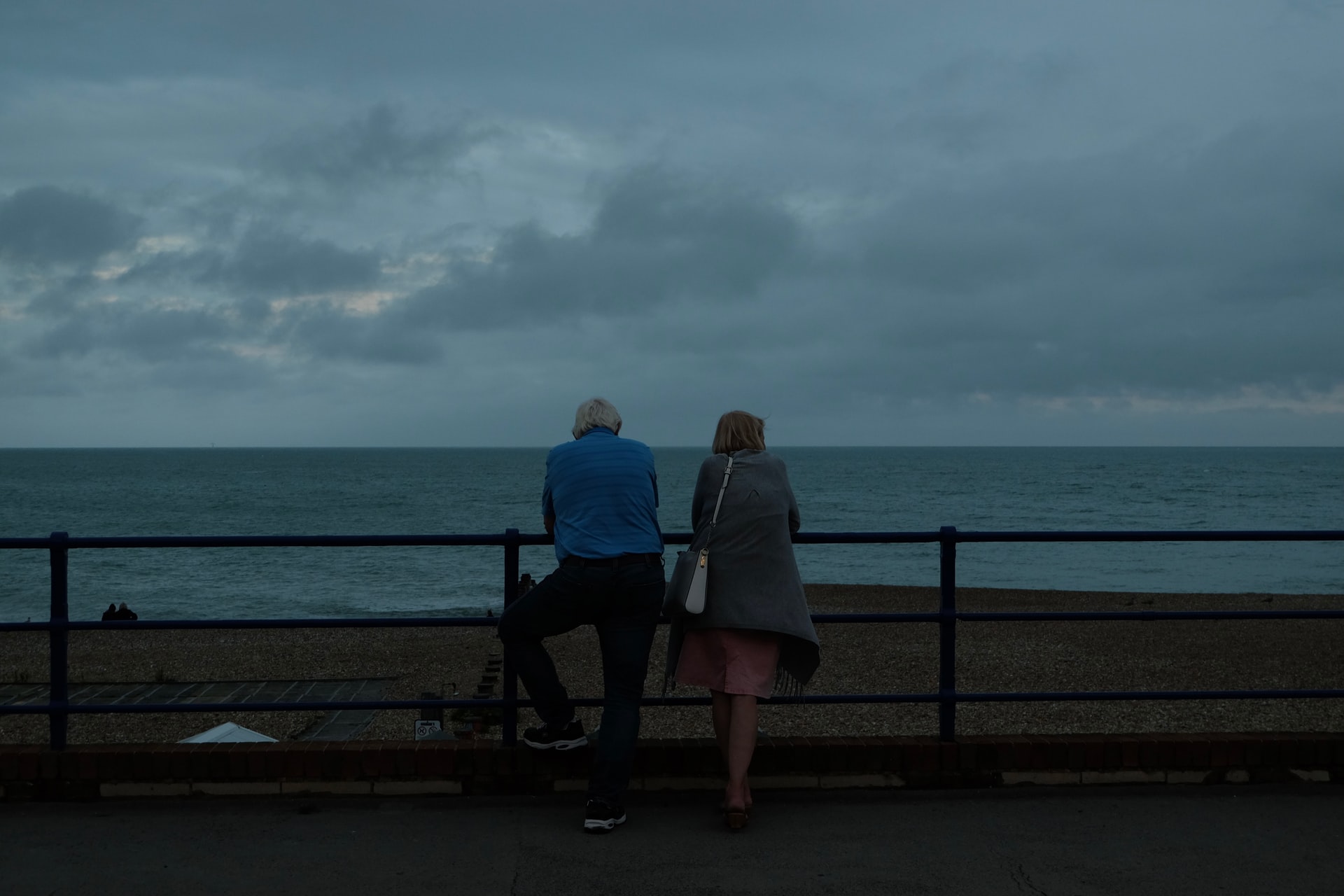 senior couple looking at lake